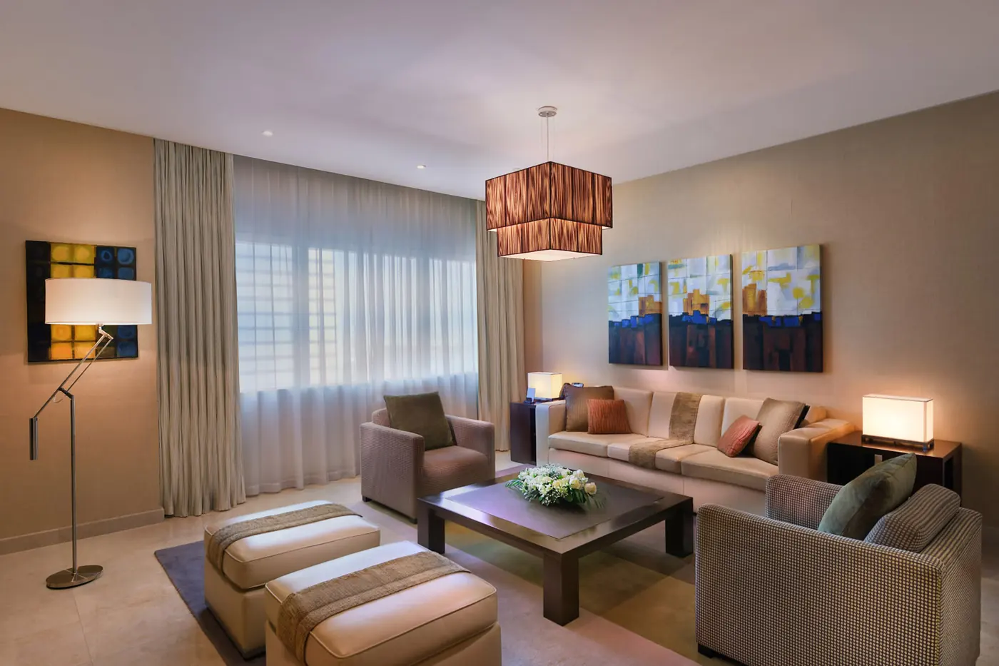 Hotel living room and lounge interior with sectional seating