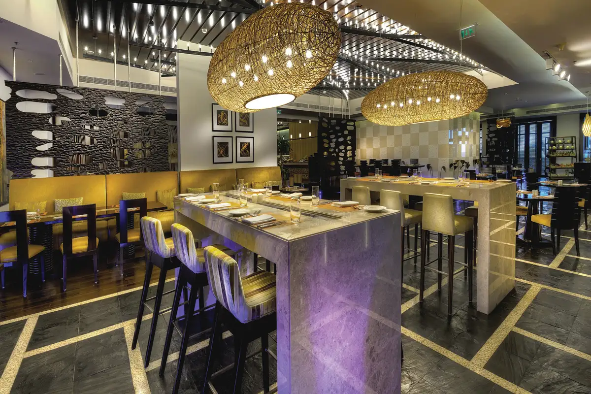 Fine dining restaurant interior photography with woven pendant lighting