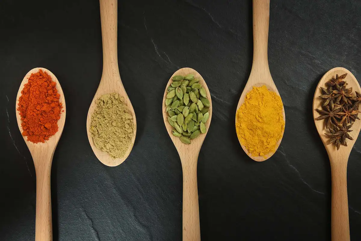 assorted spices styled for restaurant ingredient photography