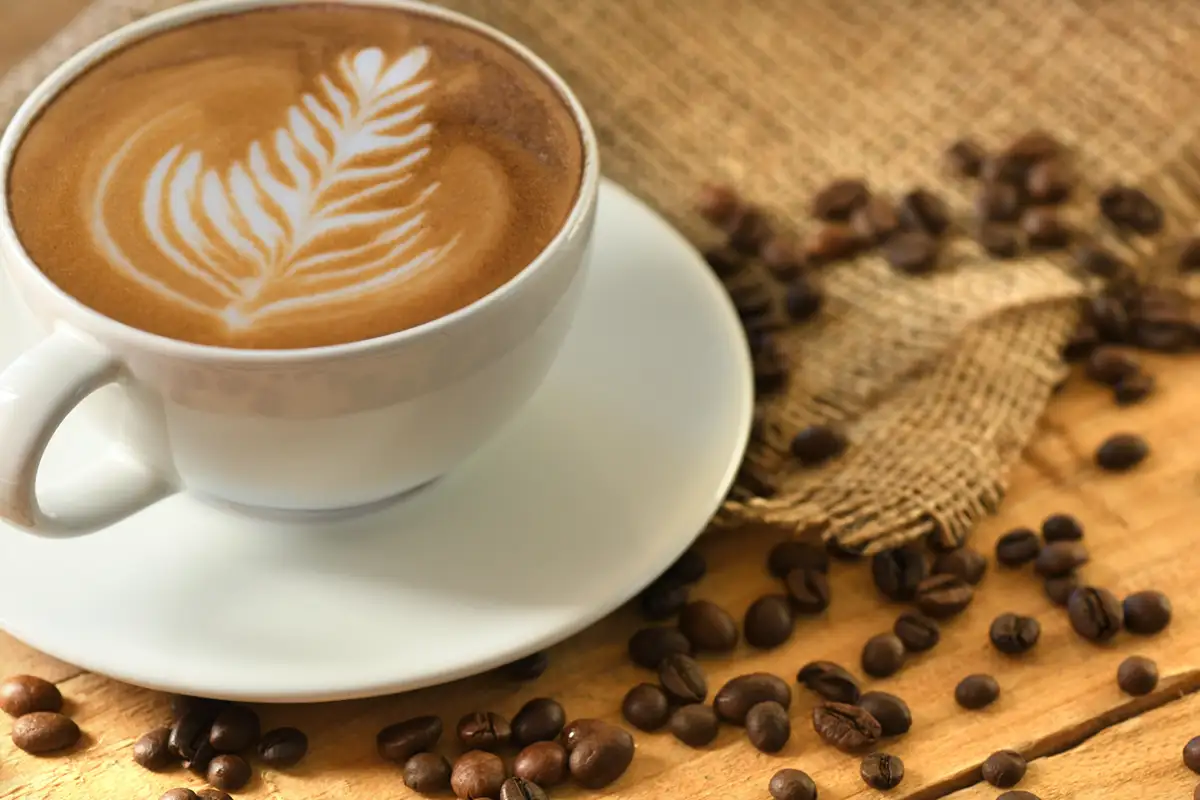 latte coffee art with coffee beans